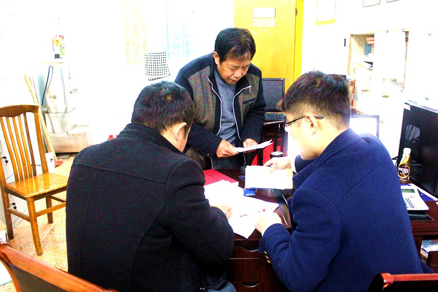 江振华:乐为山民"跑腿"的新农合协保员
